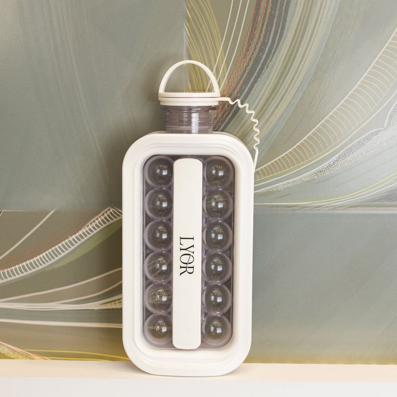 Garrafa-2-em-1-com-Forma-para-Gelo-de-Plastico-7cm-x-125cm-x-28cm-Lyor