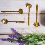 Conjunto-4-Colheres-de-Cha-de-Aco-Inox-Flores-Dourado-Wolff